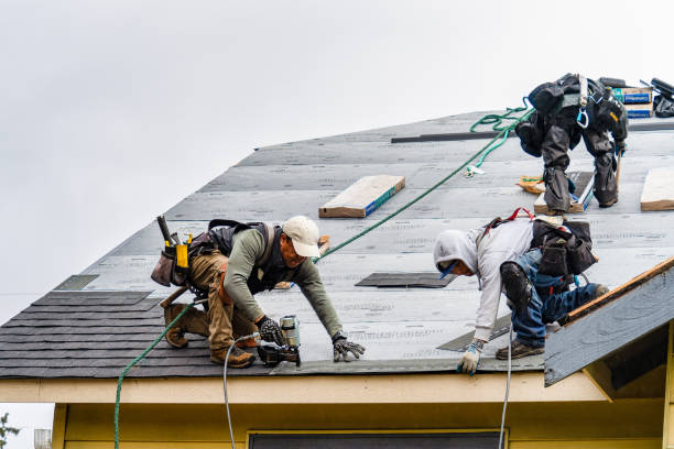 Professional Gutter Installation technician working in Hampton, NH